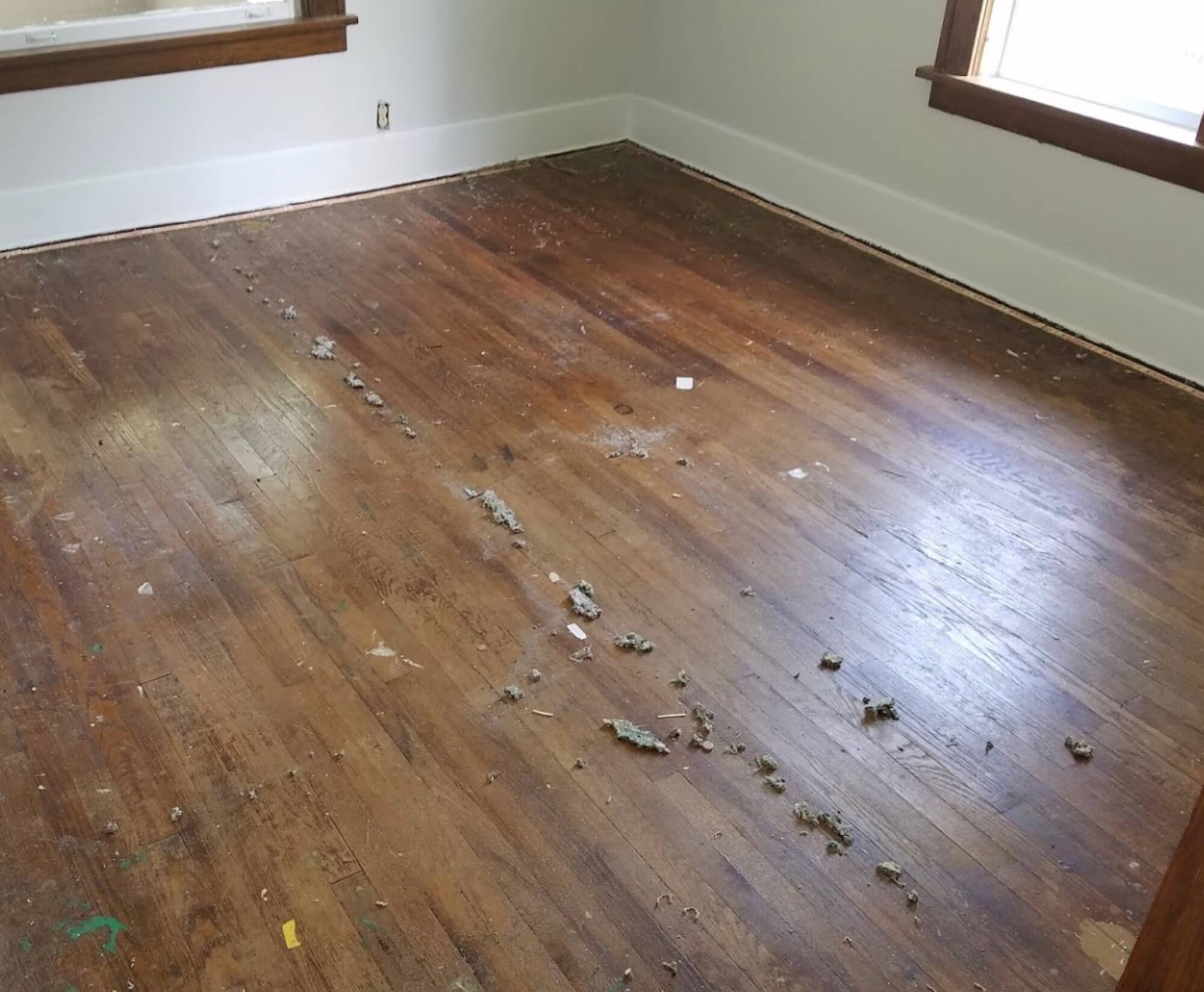 a dusty hardwood floor surface