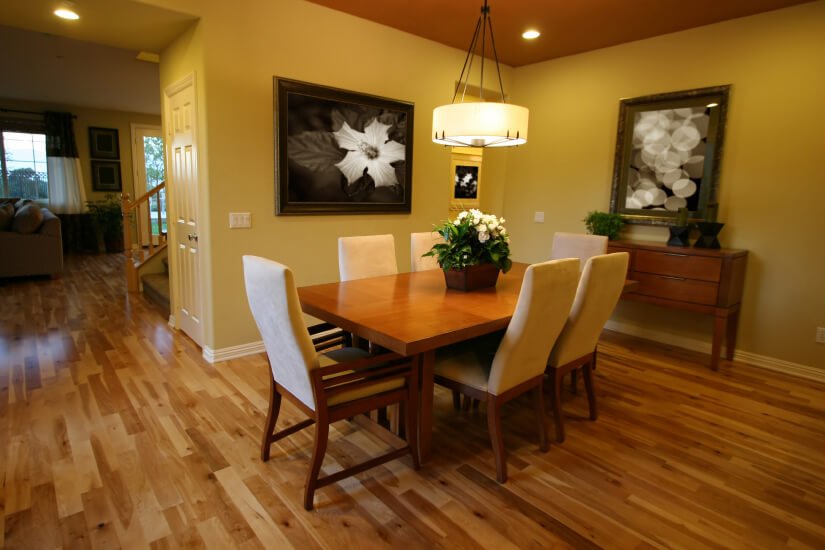 A fort collins dining rooms with floors refinished by Fabulous Floors.